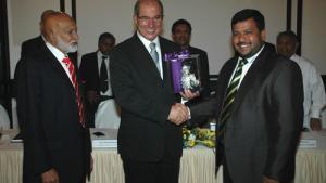 OPCW Director-General Ahmet Üzümcü (centre), Minister of Industry and Commerce, Rishad Bathiudeen (right) and A.H.M. Fowzie, Minister of Economic Development, both of Sri Lanka, at the opening of the Regional Meeting of CWC States Parties in Asia.
