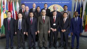 OPCW Deputy Director-General (center), OPCW Director of Inspectorate Division (center right) and the new group of chemical weapons inspectors.